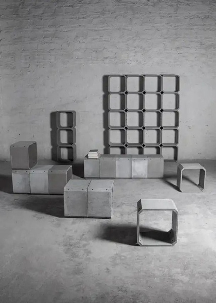 modular shelving, concrete bookshelf, display shelving, storage cubes, modern bookcase, modular furniture, brand awareness, minimalist, editorial, calm, luxurious, neutral